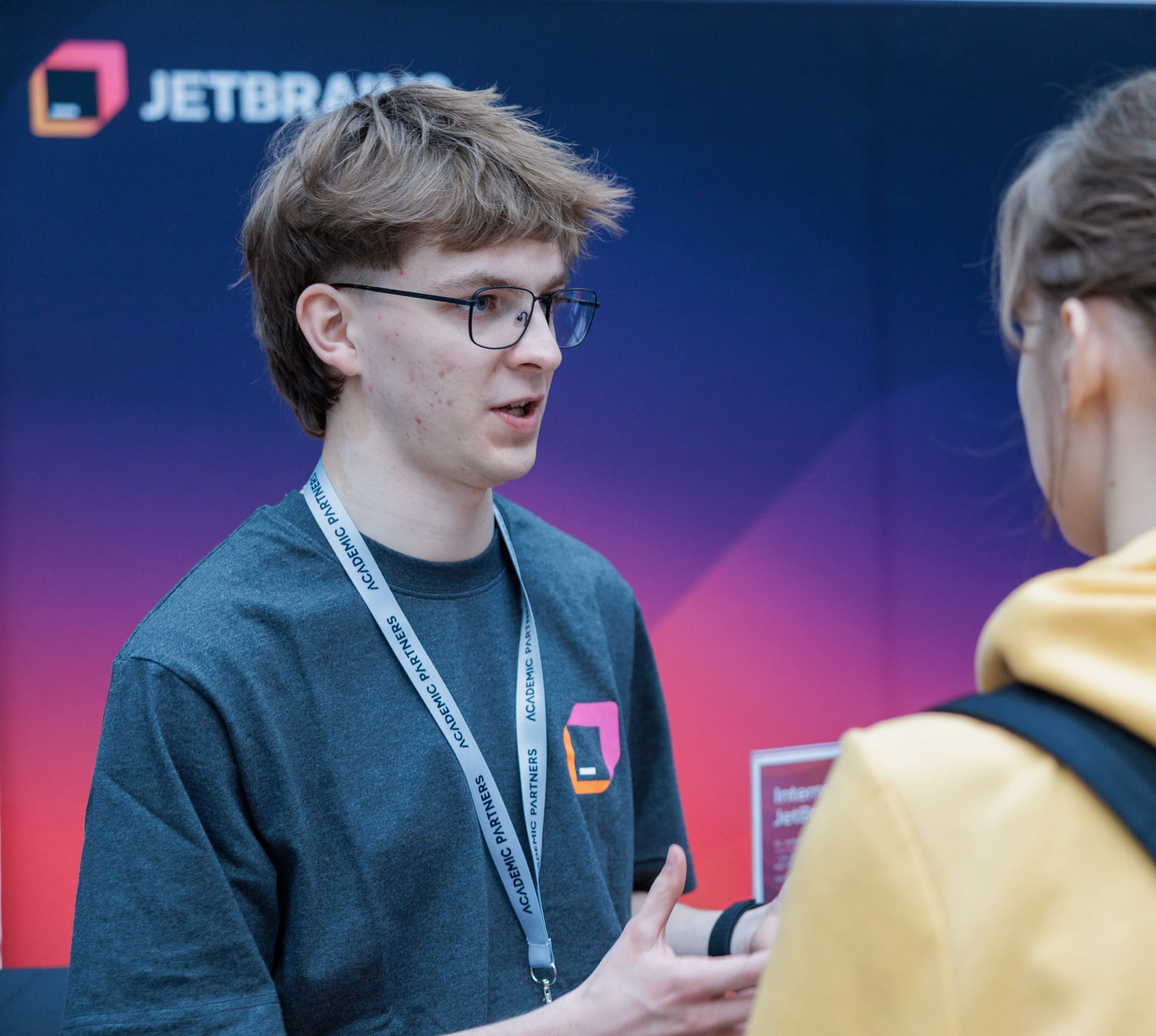 Me talking with a student at the JetBrains booth